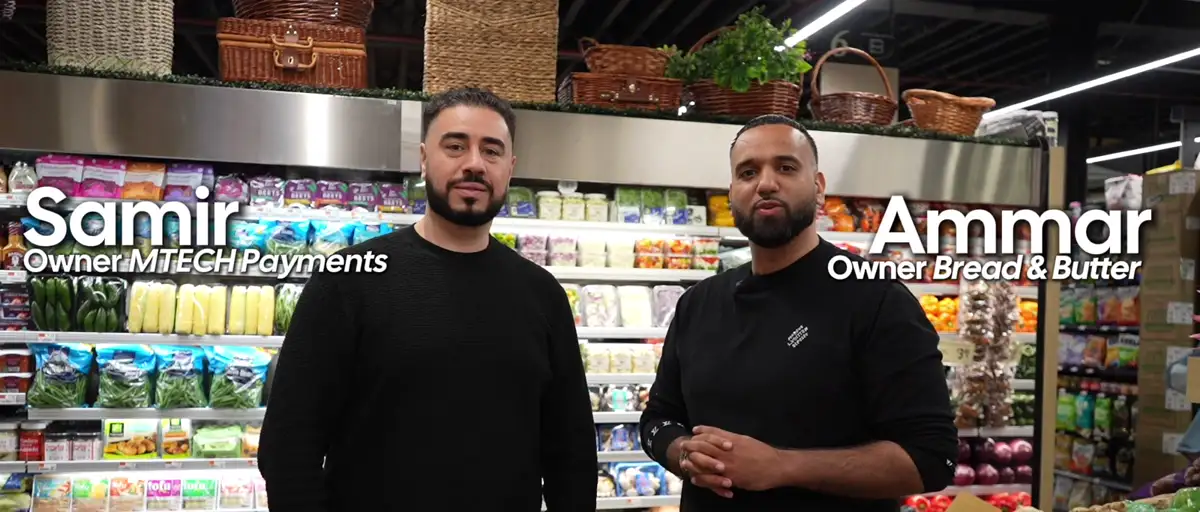 Samir of MTech with Ammar, owner of Bread & Butter Market, inside the store